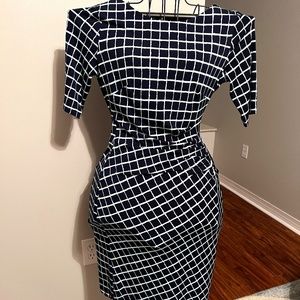 Navy blue/pale light blue (looks white) form fitting dress.